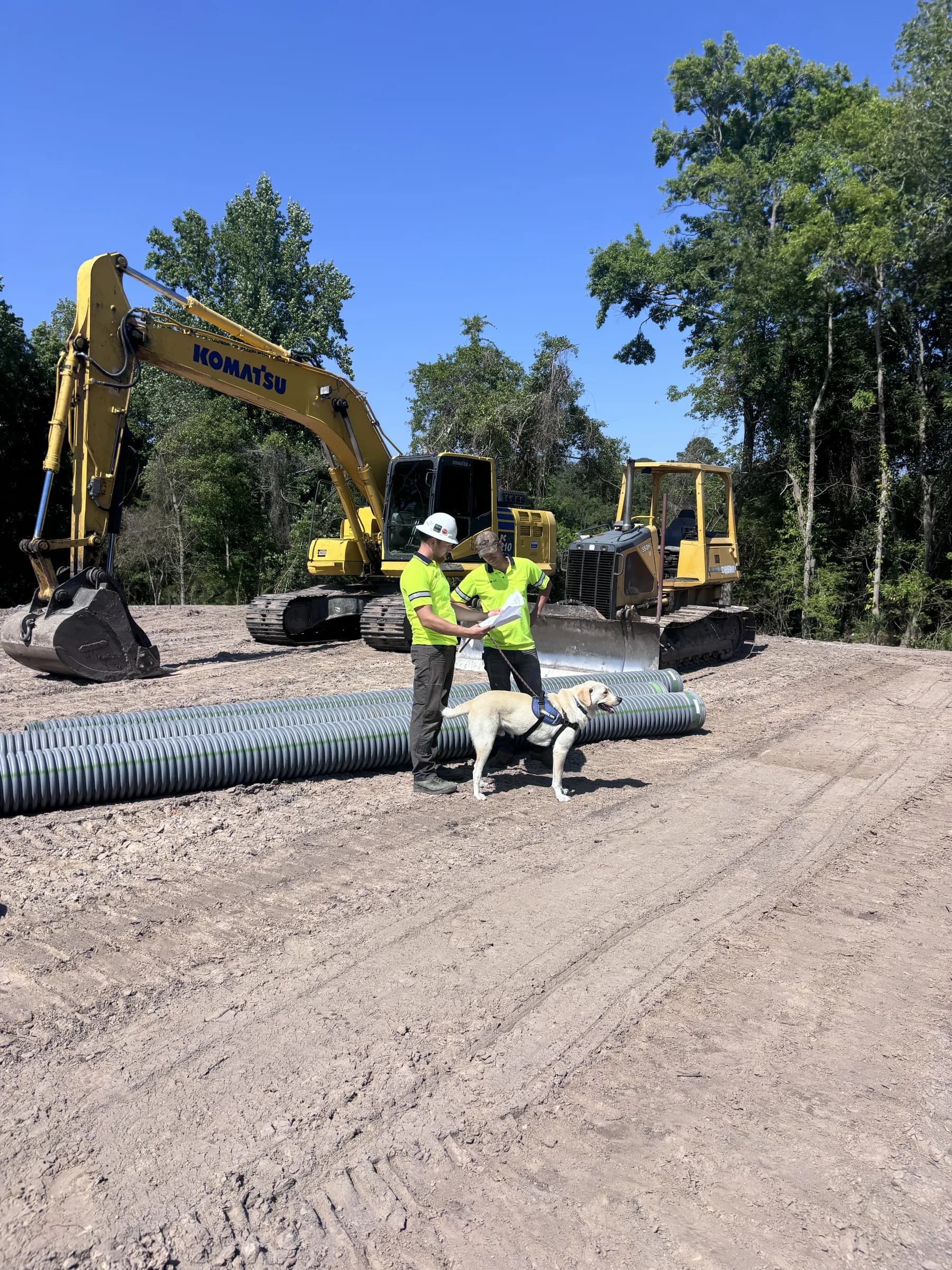 Excavator and site preparation underway on a build site in Onslow County, North Carolina